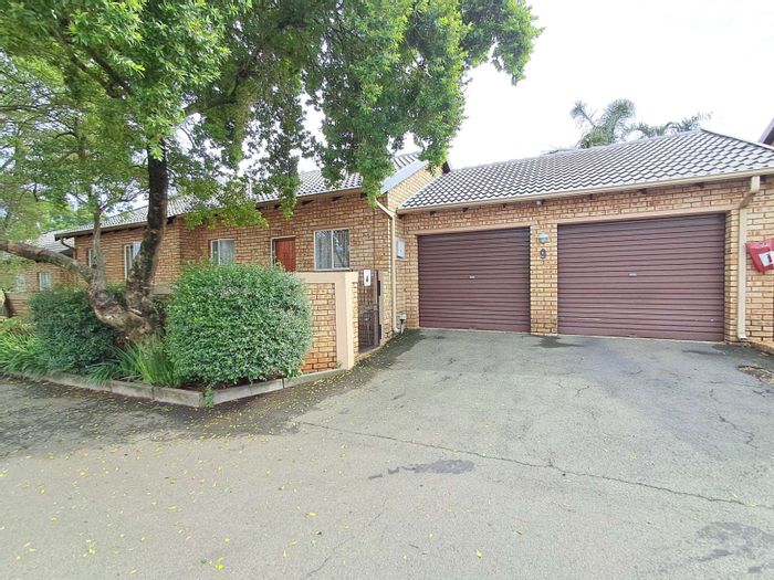 For Sale: Weltevreden Park Townhouse with 3 beds, double garage, and pet-friendly garden.