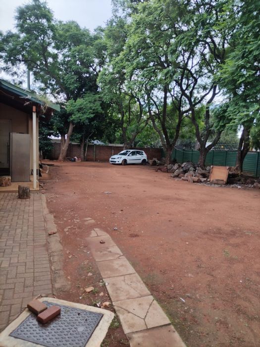 For Sale: 4-bedroom house in Polokwane Central with ample parking and redevelopment potential.