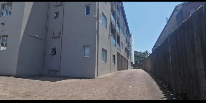 Morningside Apartment For Sale: 2 Bedrooms, balcony, parking, open-plan living.