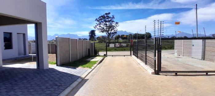 3-Bedroom Townhouse for Sale in Pacaltsdorp with secure parking and private garden.