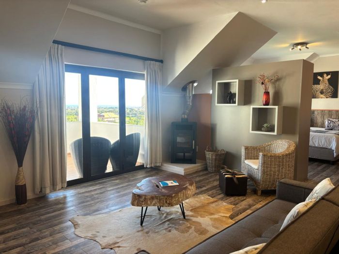 1-Bedroom Apartment To Rent in Firlands with pool, braai facilities, and mountain views.