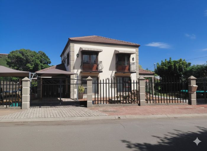 For Sale: Spacious 4-bedroom house in Bergsig with ample parking and outdoor space.