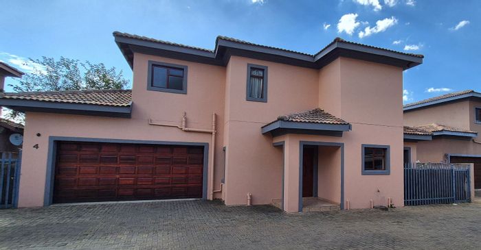 Lydenburg Central Townhouse For Sale: 3 beds, double garage, secure complex amenities.