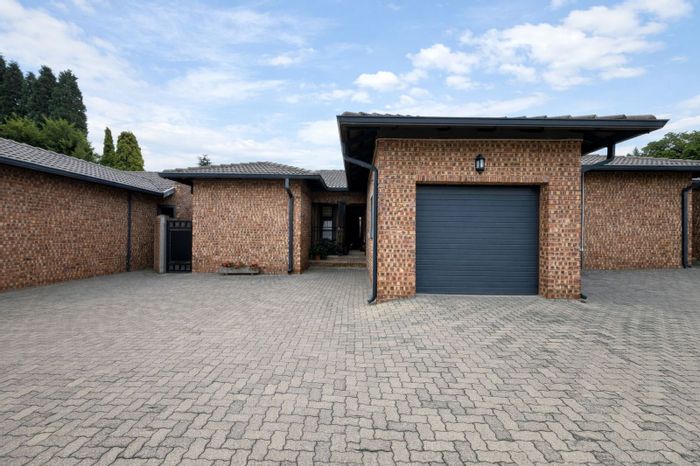 For Sale: Townhouse in Ermelo Central with 2 bedrooms, courtyards, and garage.